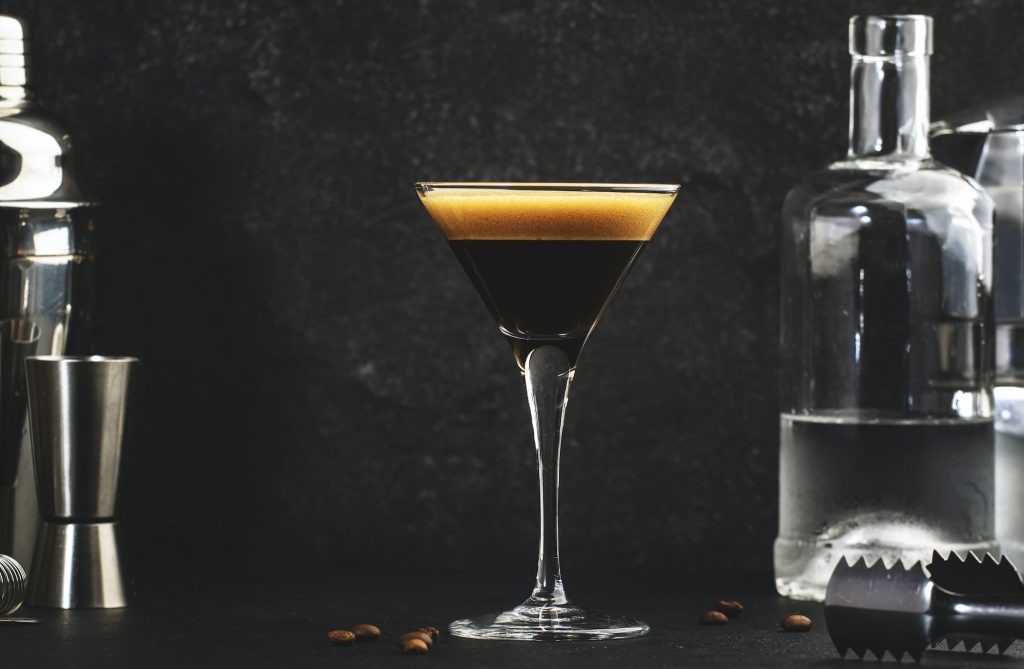 Espresso martini cocktail with vodka, coffee liqueur, syrup and ice