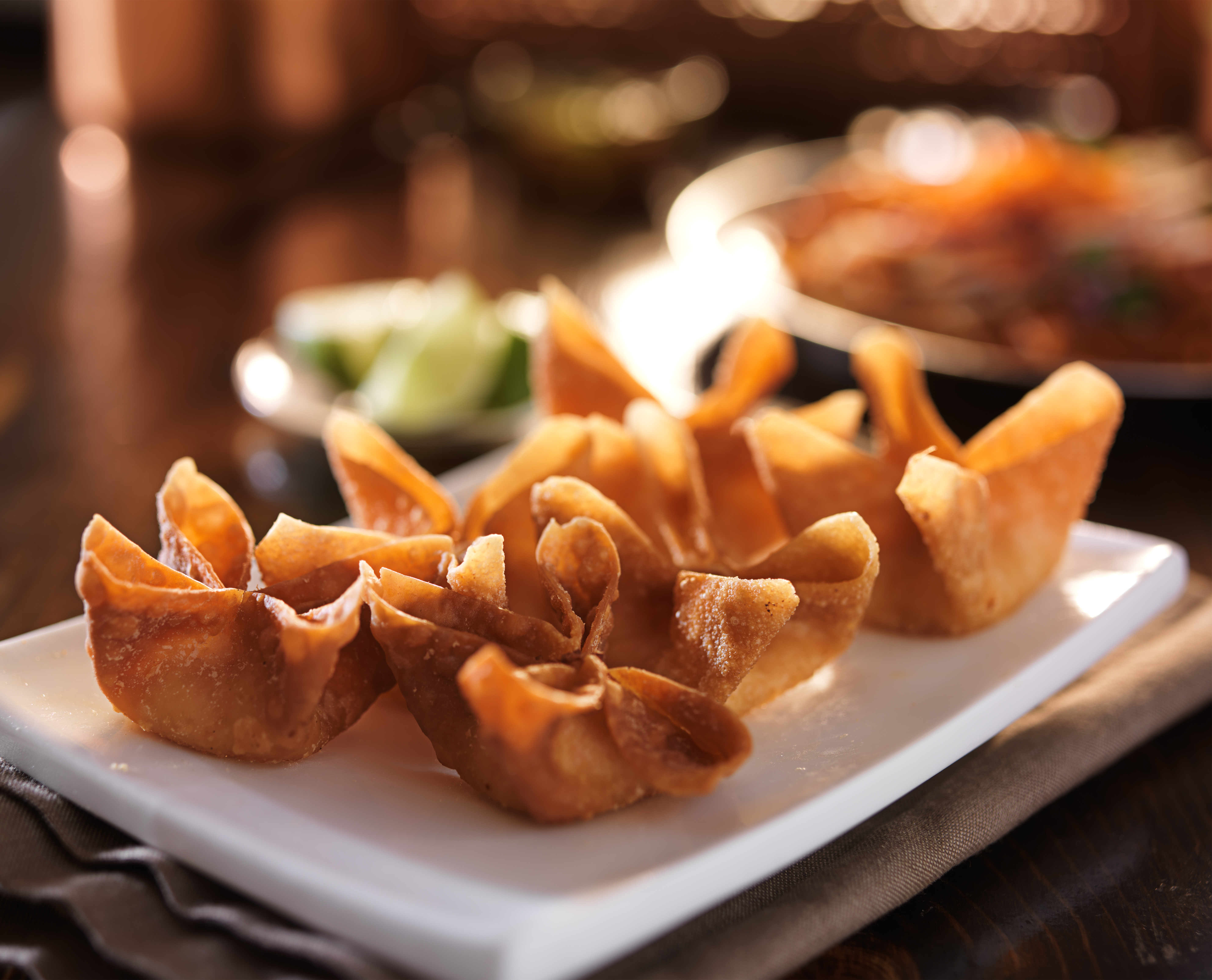 fried crab rangoon appetizer on plate