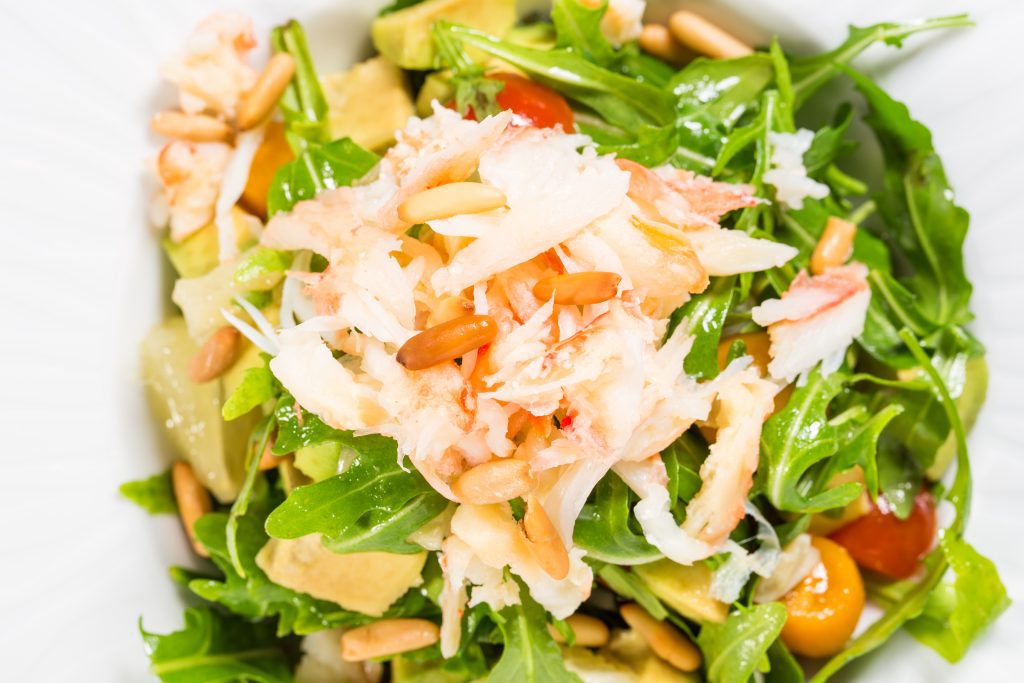 Snow crab salad with pomelo and arugula.